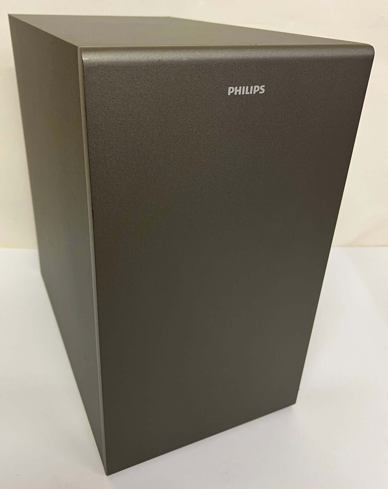 PHILIPS TAB8905/10 subwoofer with sleek design, part of the 360W soundbar system for rich audio experience.