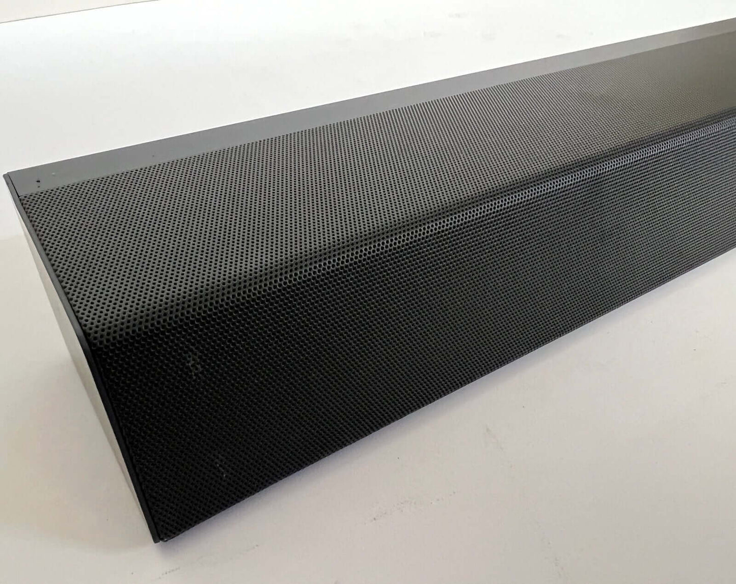 Philips TAB8805/10 wireless soundbar showcasing sleek design with perforated mesh for premium audio experience.