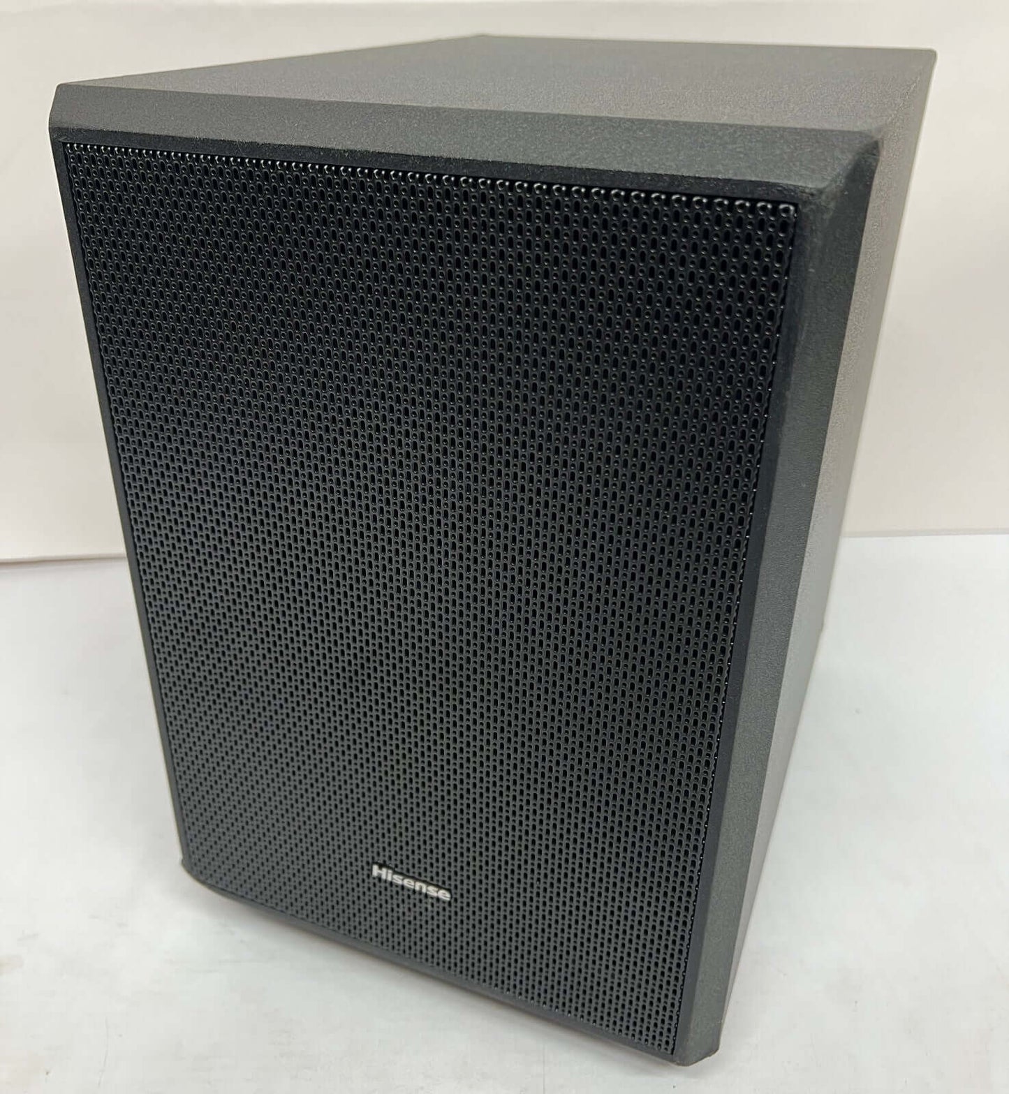 Black compact speaker with textured grill, ideal for enhancing audio systems.