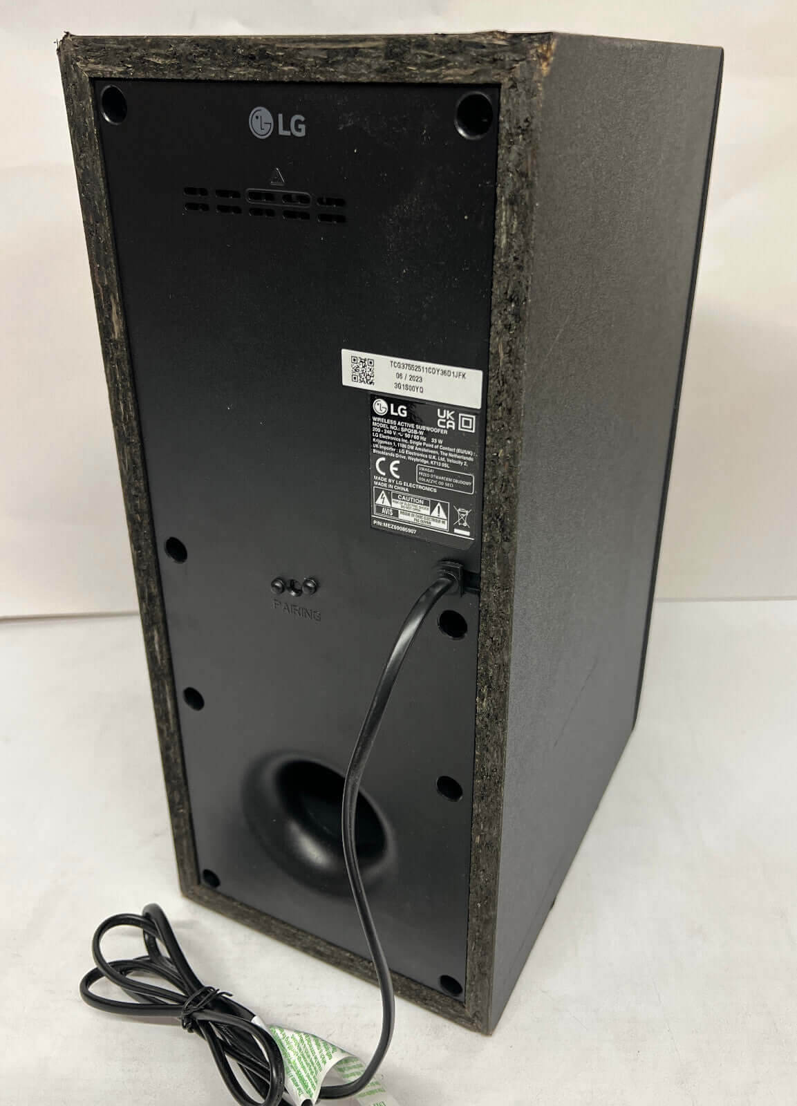 LG US40T wireless subwoofer back view showing ports and branding.