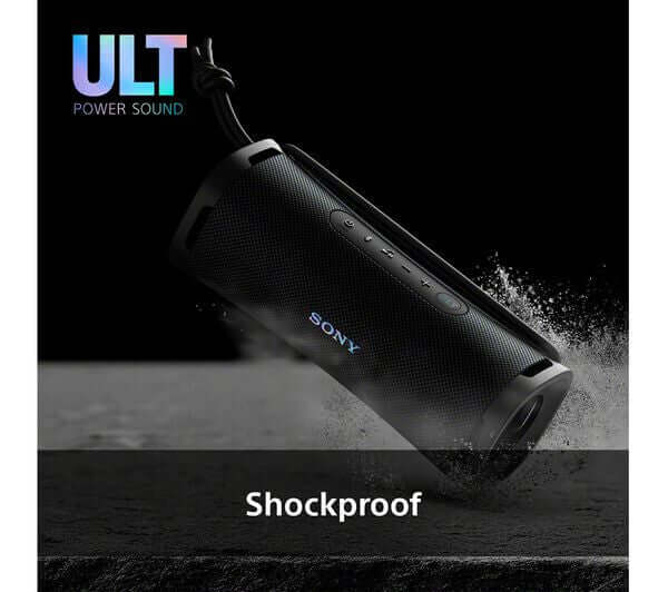 SONY ULT FIELD 1 PORTABLE WIRELESS BLUETOOTH SPEAKER RECHARGEABLE IP67 BLACK on a wet surface highlighting its shockproof feature.