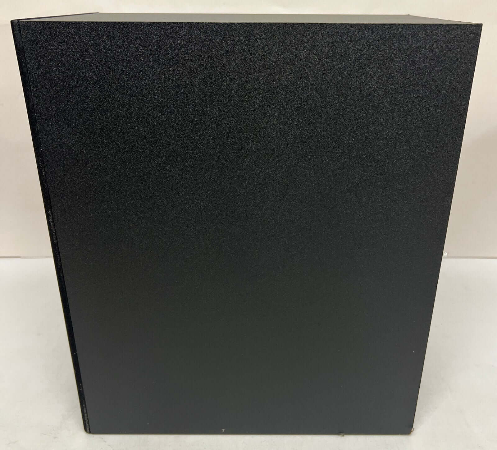 Black soundbar subwoofer, clear design, designed for premium audio experience with Dolby Atmos technology.