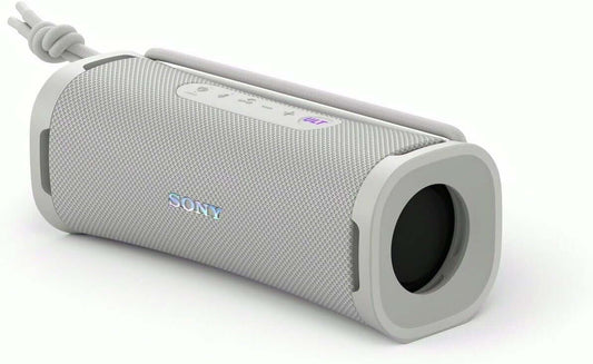 SONY ULT FIELD 1 portable wireless Bluetooth speaker in off white with waterproof design and pairing feature.