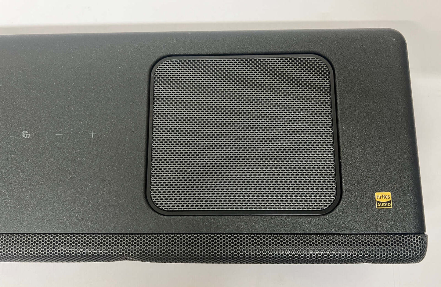 Close-up view of SONY HT-A5000 soundbar top with controls and speaker grille.