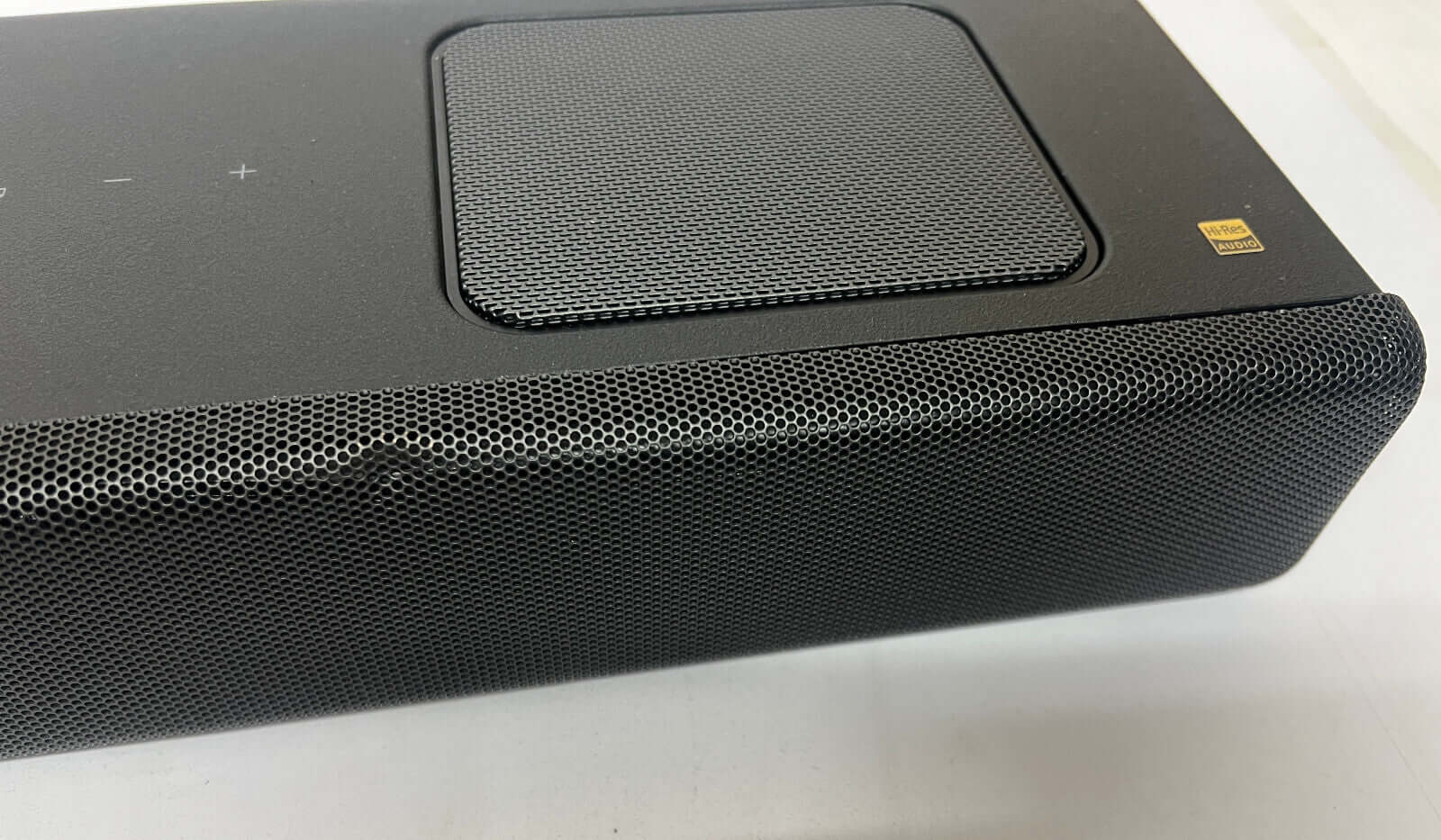 Close-up view of the SONY HT-A5000 soundbar with mesh grille and control panel.