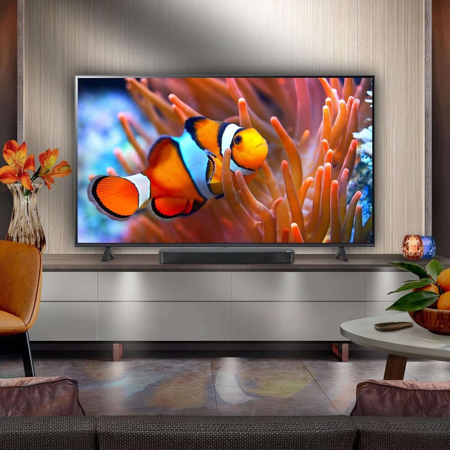 LG SQM1 SOUNDBAR WIRELESS BLUETOOTH COMPACT 40W OPTICAL PORT 3.5MM USB BLACK displayed under a vibrant TV.