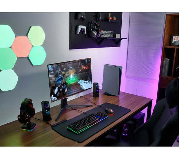 LG 27" MONITOR OLED ULTRAGEAR GAMING QUAD HD 1440P HDMI DISPLAYPORT 27GR95QE setup with gaming accessories on a desk.