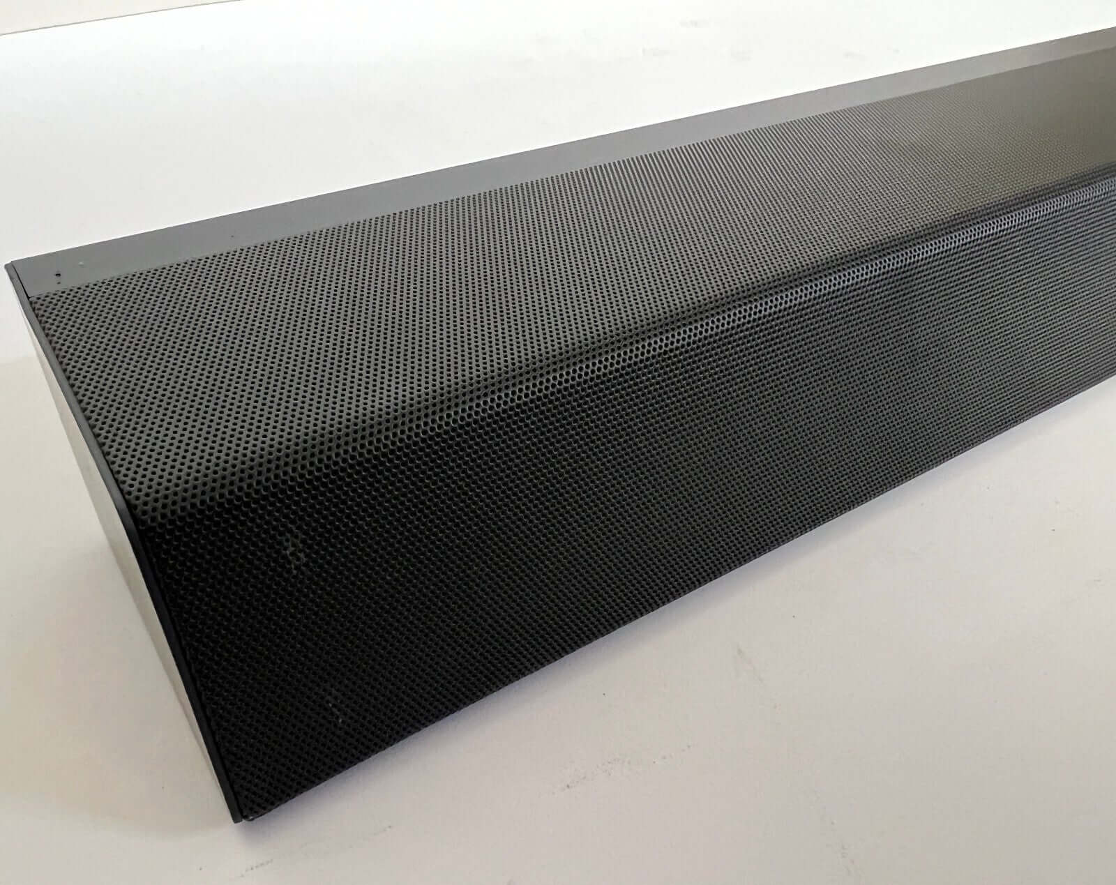 Philips TAB8805/10 wireless soundbar showcasing sleek design with perforated mesh for premium audio experience.
