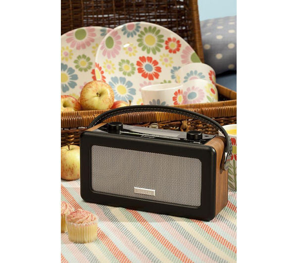 ROBERTS VINTAGE PORTABLE RETRO DAB FM DIGITAL RADIO MAINS/BATTERY LCD DISPLAY on a picnic table with food.