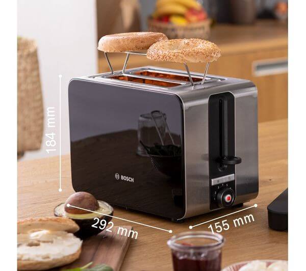 BOSCH SKY TAT7203GB 2 SLICE MODERN TOASTER 1050W STAINLESS STEEL BLACK on wooden table with bagels