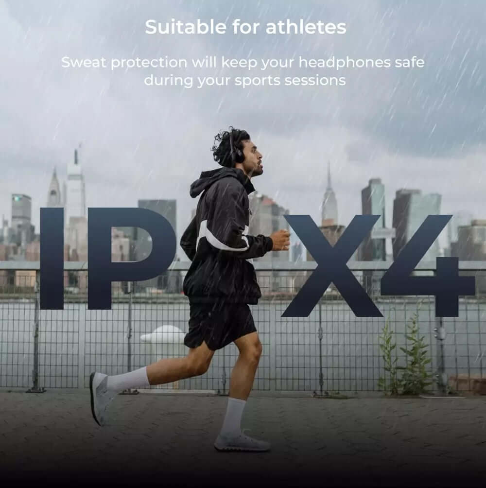 Athlete running outdoors with balln audio Lifestyle Pro headphones, showcasing sweat protection for sports sessions.