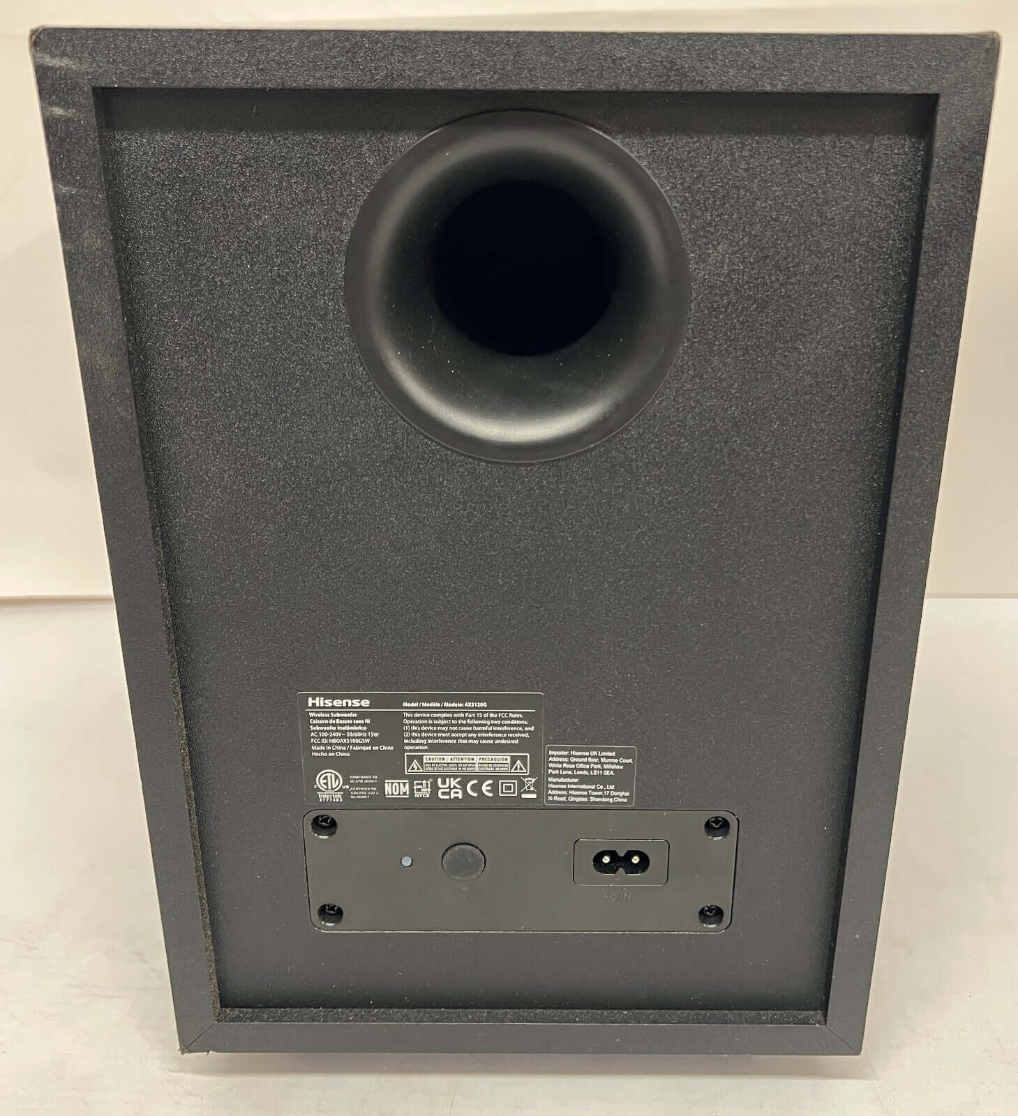 Back view of Hisense AX3120G wireless subwoofer, featuring ports and vent for enhanced audio performance.