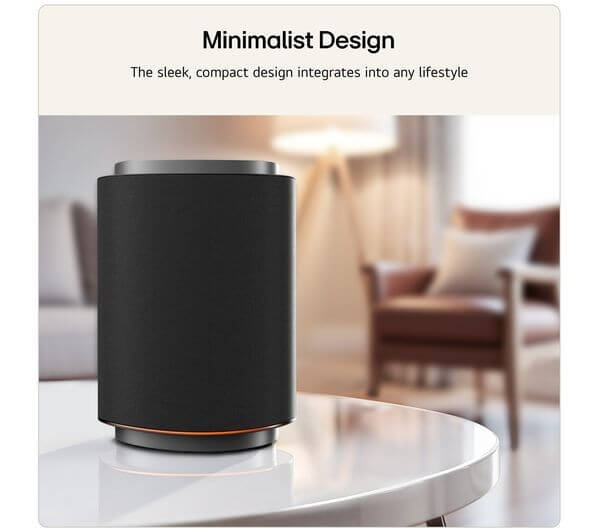 LG Sound Suite M5 wireless speaker with minimalist design, sleek black finish on a table in a cozy living room.