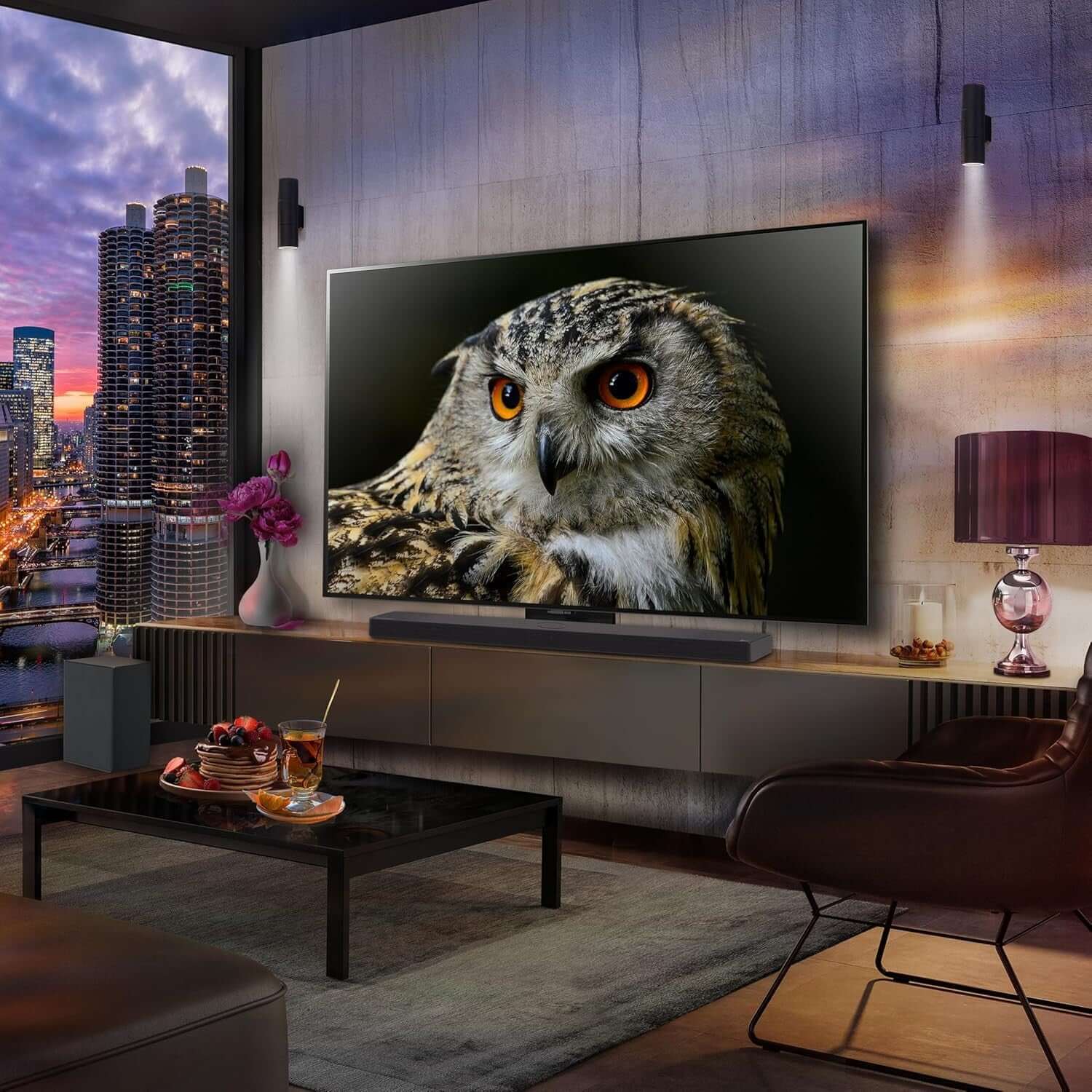 A stylish living room featuring the LG USC9S SOUNDBAR HOME CINEMA 3.1.3 WIRELESS SUBWOOFER 4K DOLBY ATMOS RRP £999 with a large TV.