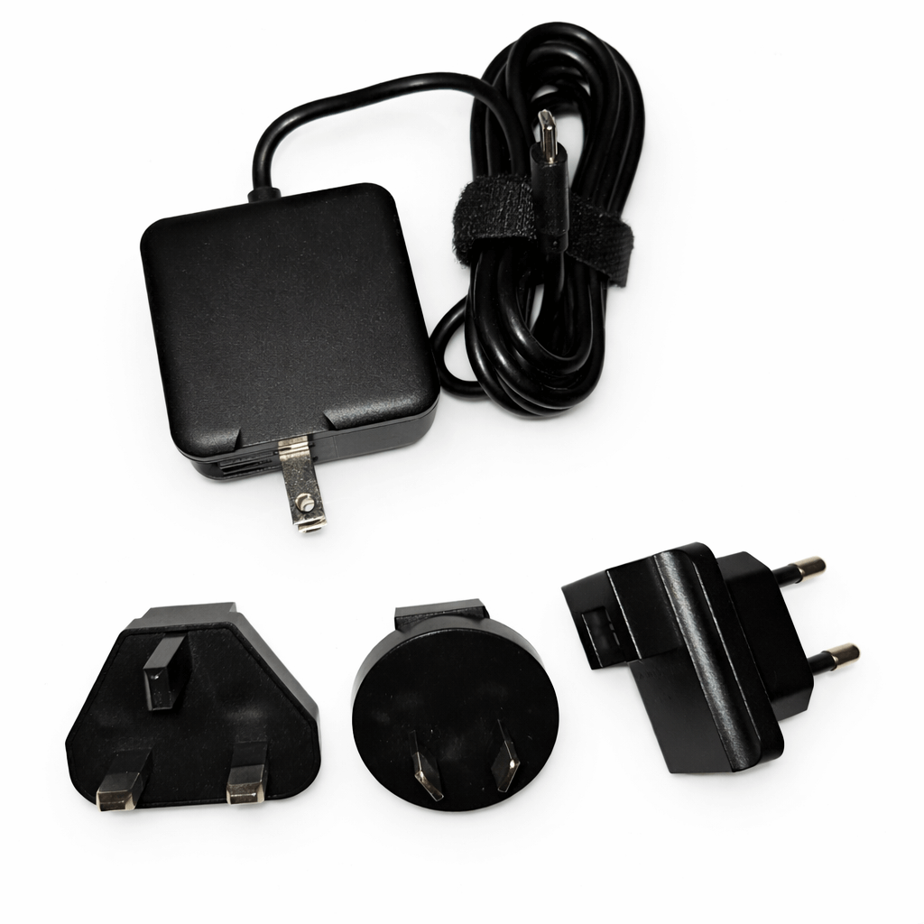 Pico Genie Impact 4.0 Plus 1080p Ultra Portable Projector power adapter with interchangeable plugs.